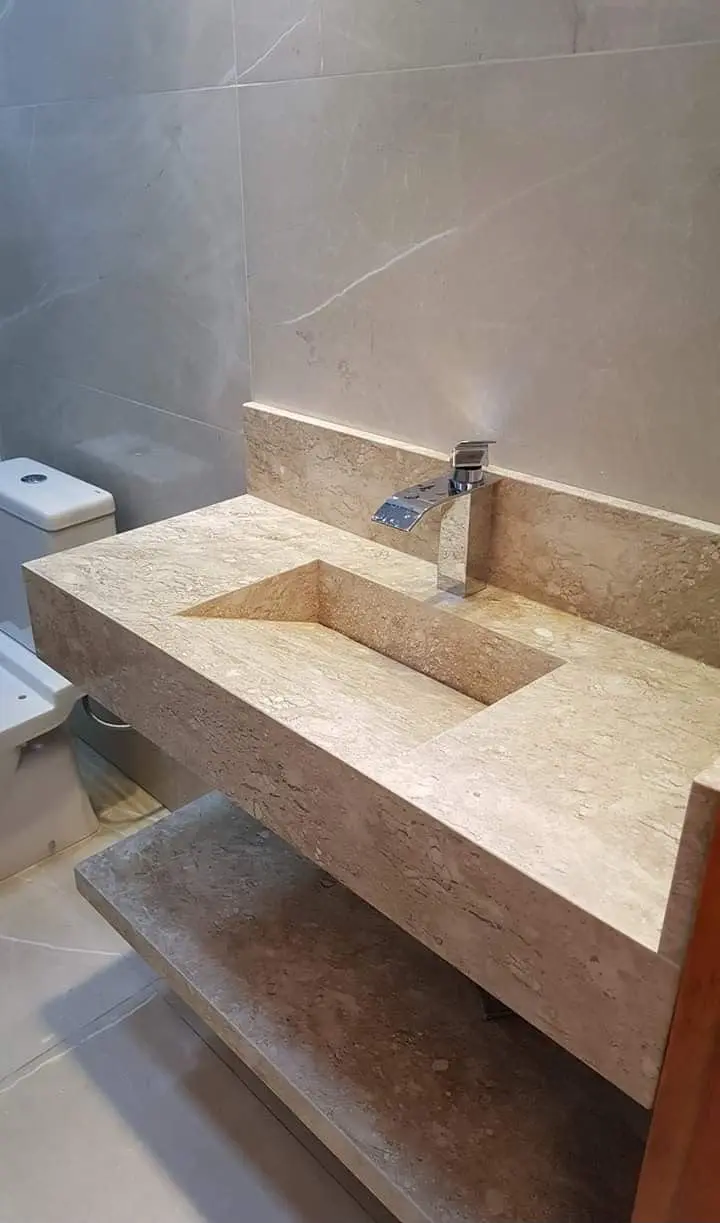 Lavabo completo en piedra con grifería instalada
